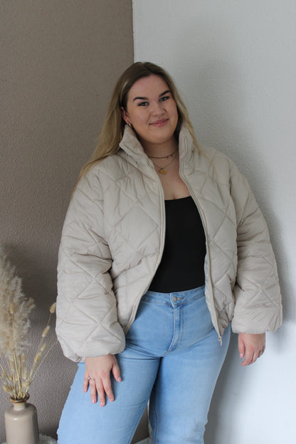 Beige pufferjas